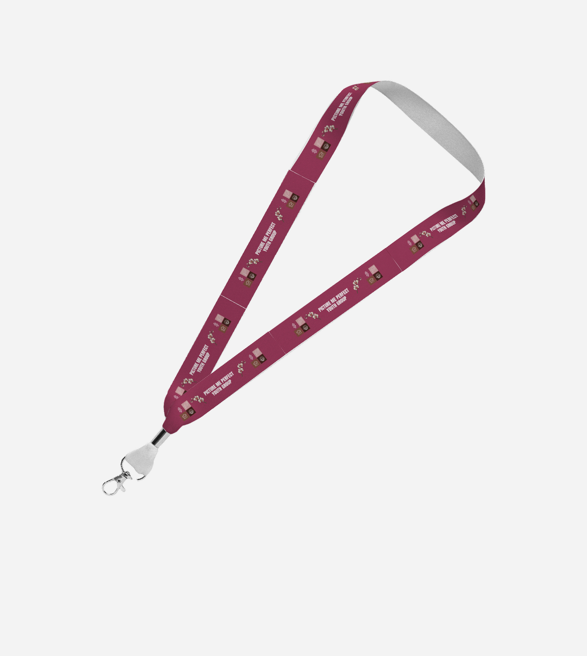 Deep berry PMPYG lanyard printed with orchids and the Picture Me Perfect Youth Group name